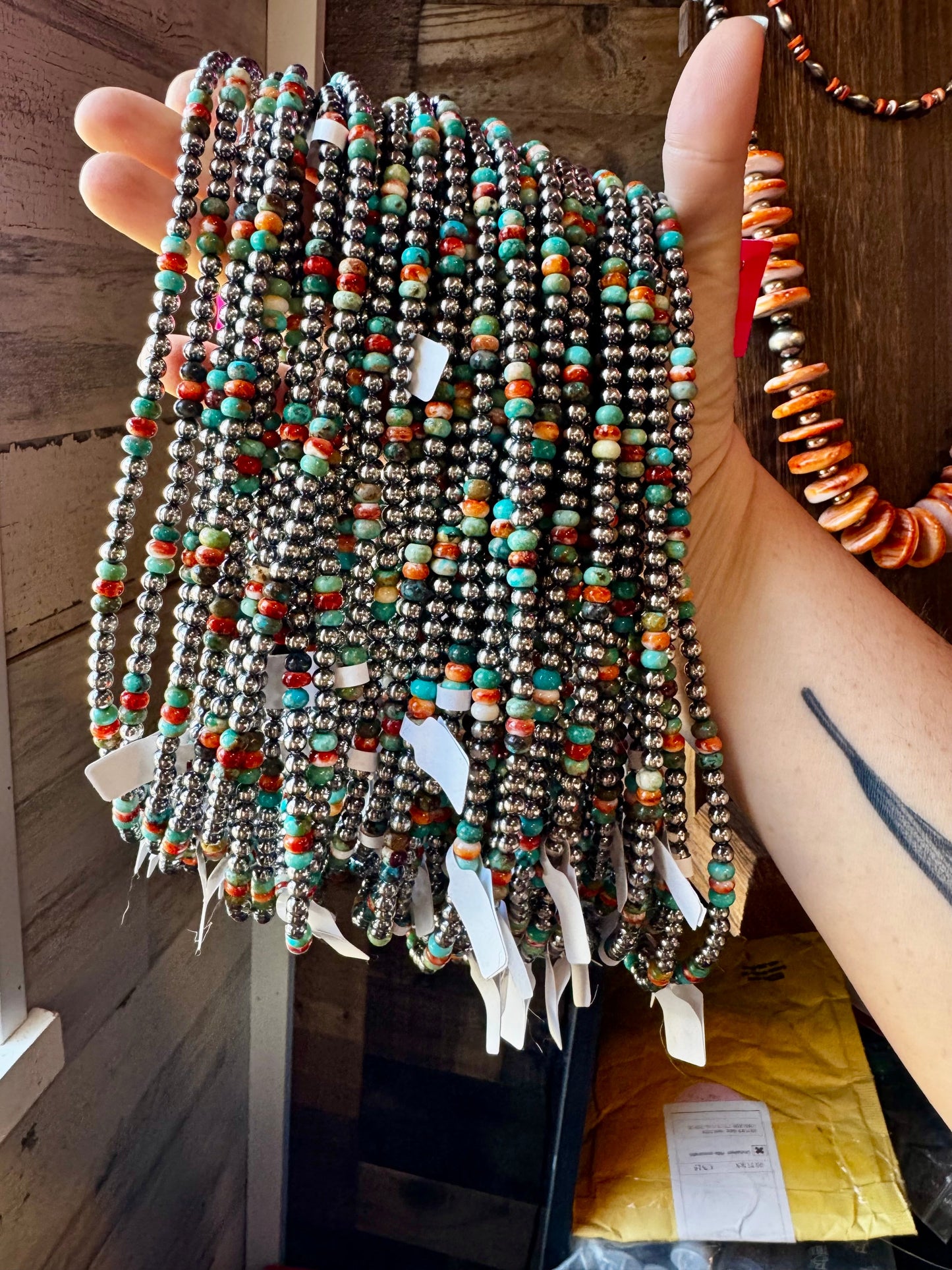 Handmade 18-inch sterling silver pearl necklace with turquoise and spiny oyster beads, shown with extender for layering