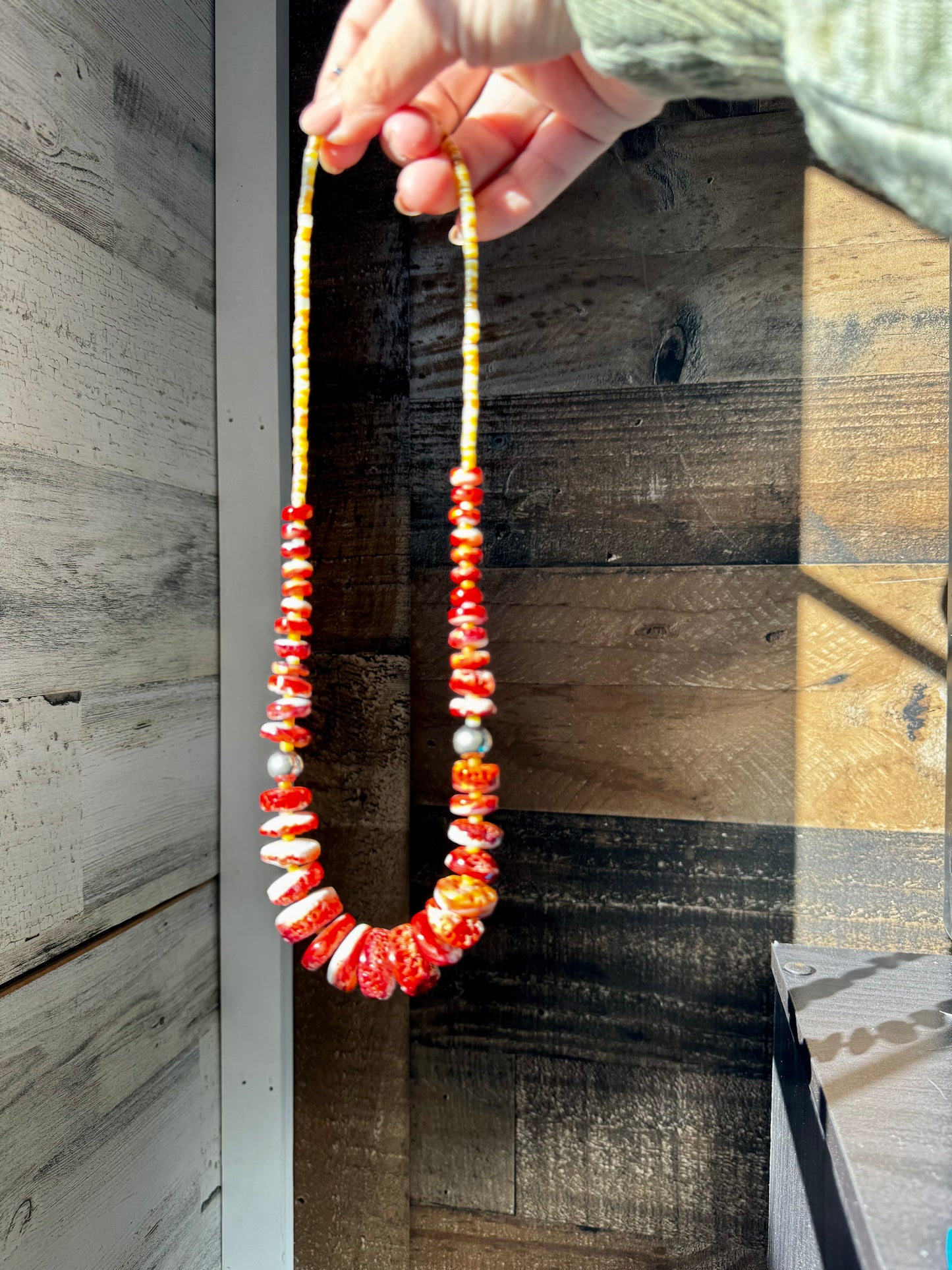 22 Inch orange spiny and sterling silver pearls