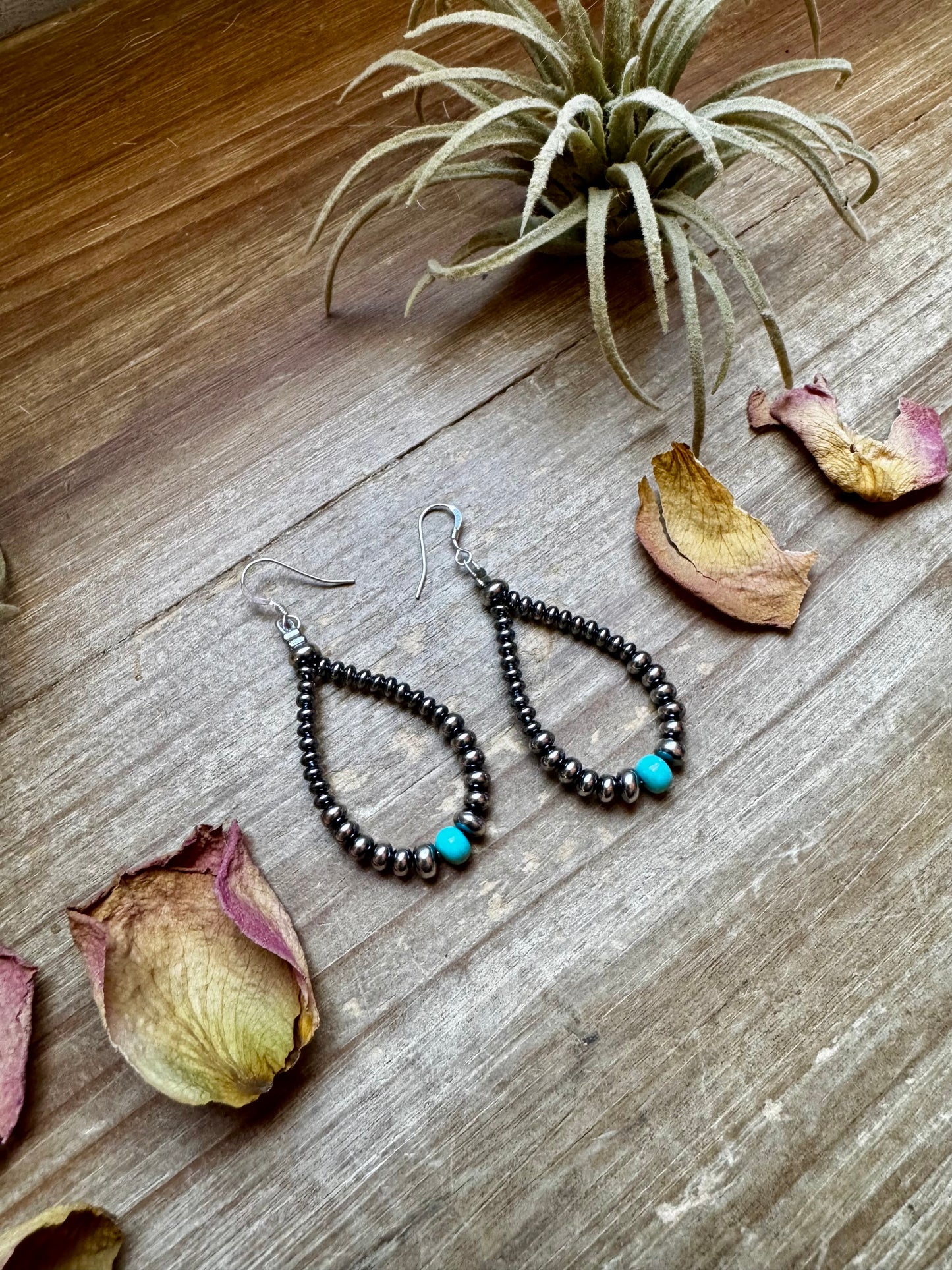2.5-inch handmade earrings featuring 4mm, 5mm, and 6mm saucer sterling silver pearls with 6mm Mexican turquoise stones. Finished with .925 sterling silver hooks. Each turquoise stone is naturally unique. Lightweight and handcrafted in the USA by The Bijoux FAB.