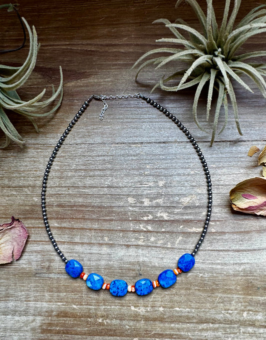 Handmade choker with sterling silver pearls, orange spiny oyster, and faceted rectangular lapis beads, perfect for summer