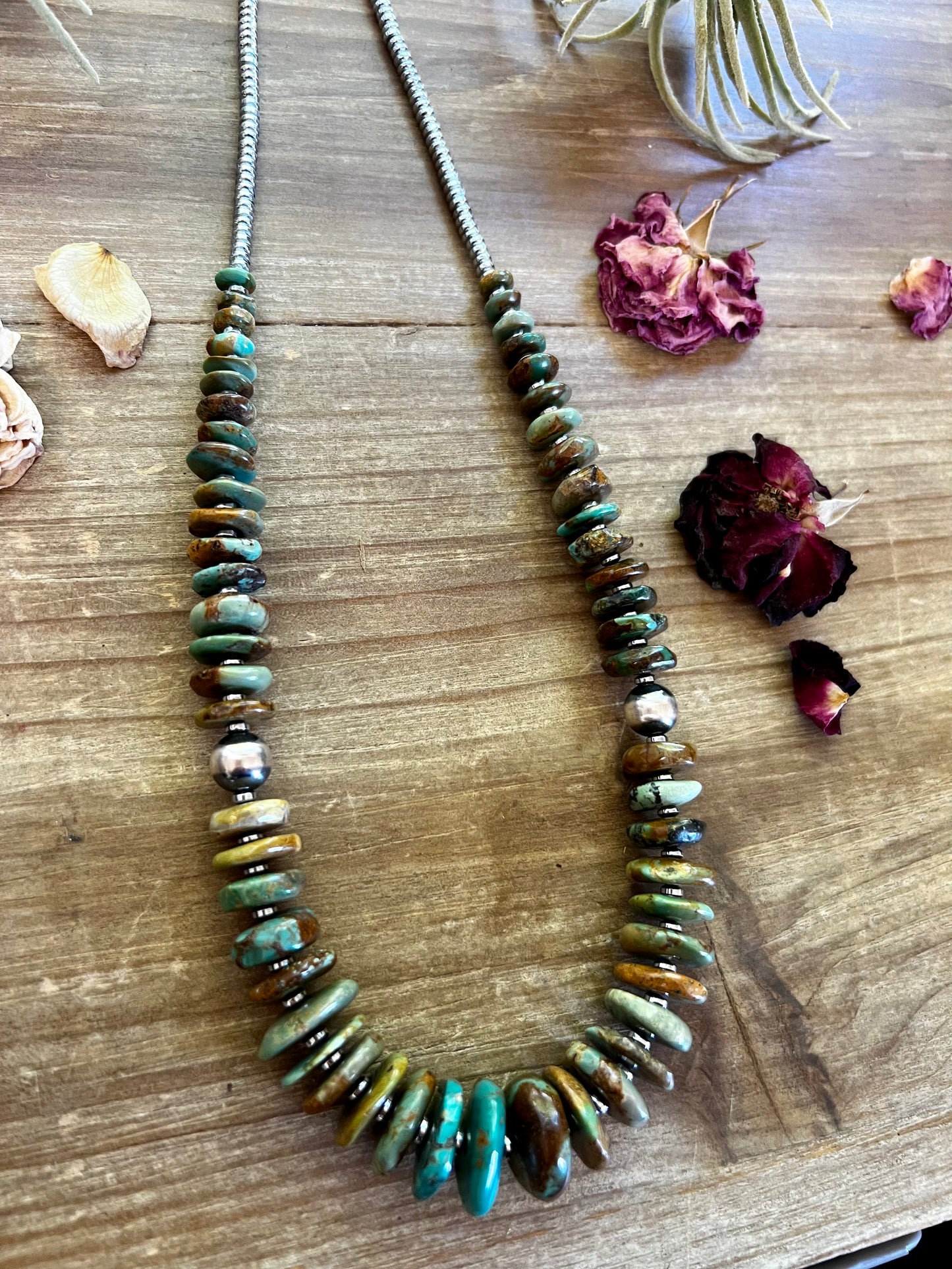 22 inch graduated turquoise necklace with Navajo pearl