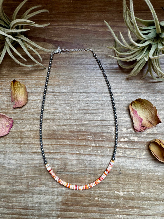 15-inch handmade necklace with orange spiny oyster heishi and sterling silver pearls, made in the USA