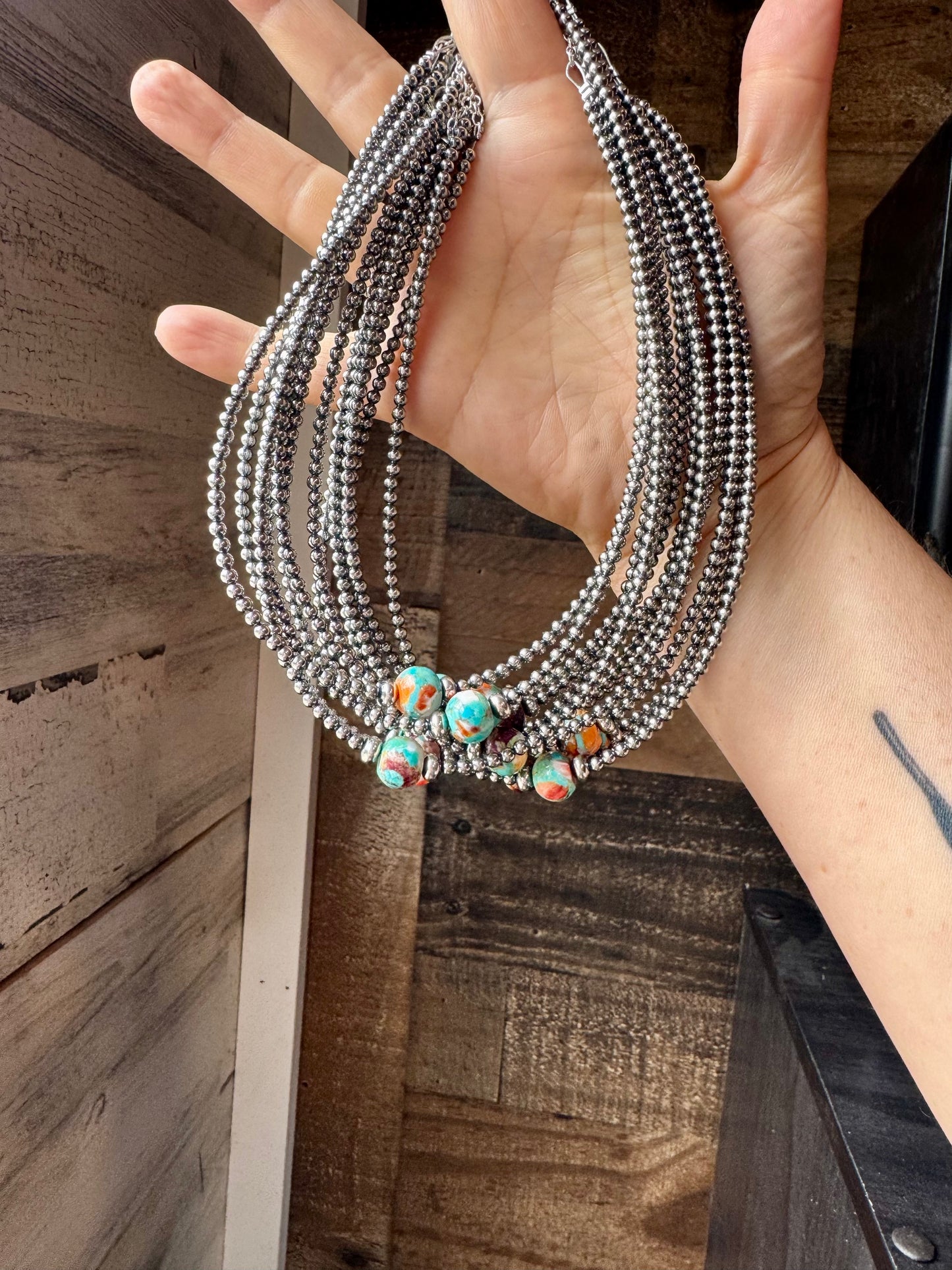Handmade 14-inch sterling silver pearl choker with a center Mojave bead framed by 5mm saucers, finished with extender, made by The Bijoux FAB