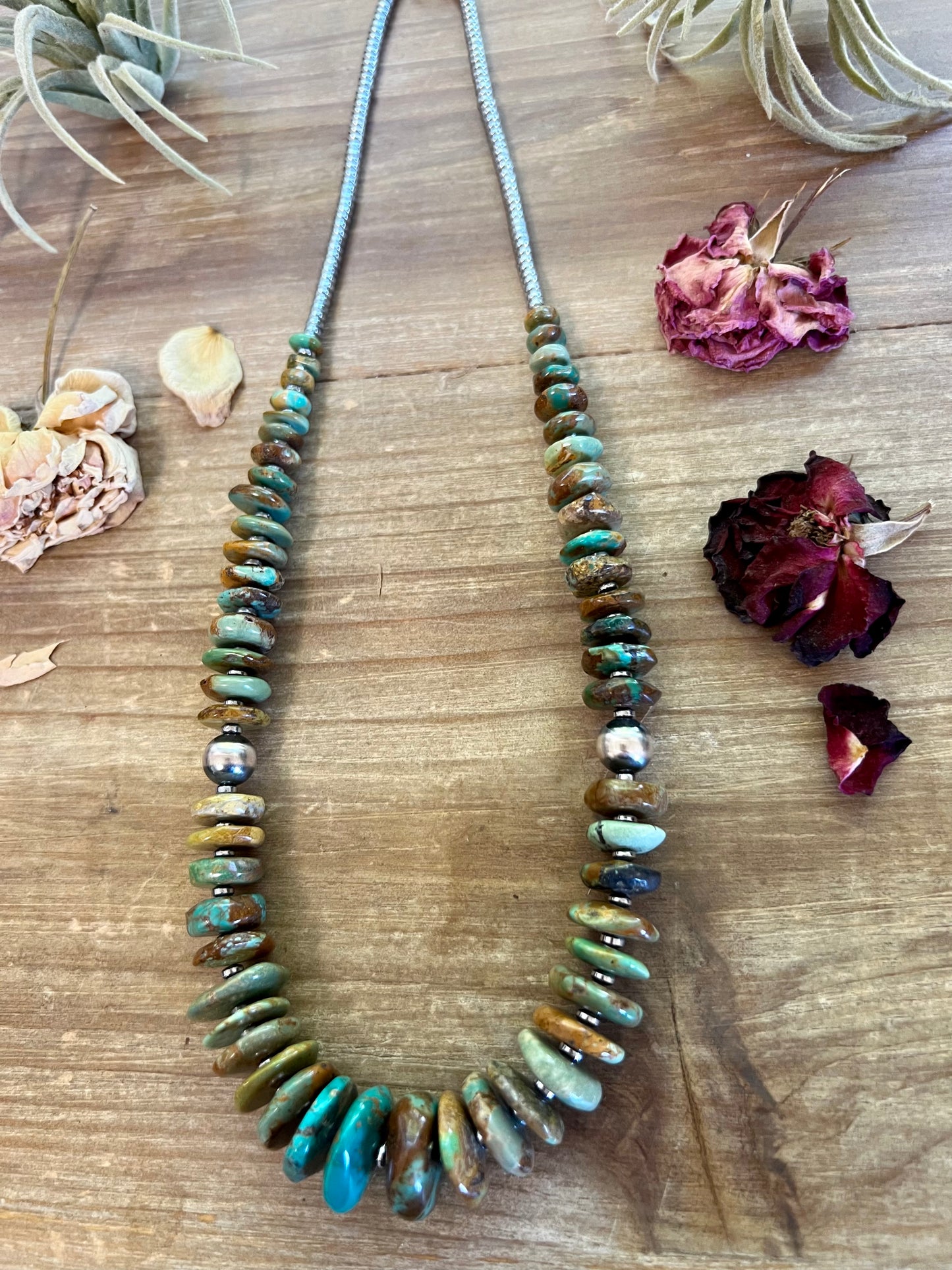 22 inch graduated turquoise necklace with Navajo pearl