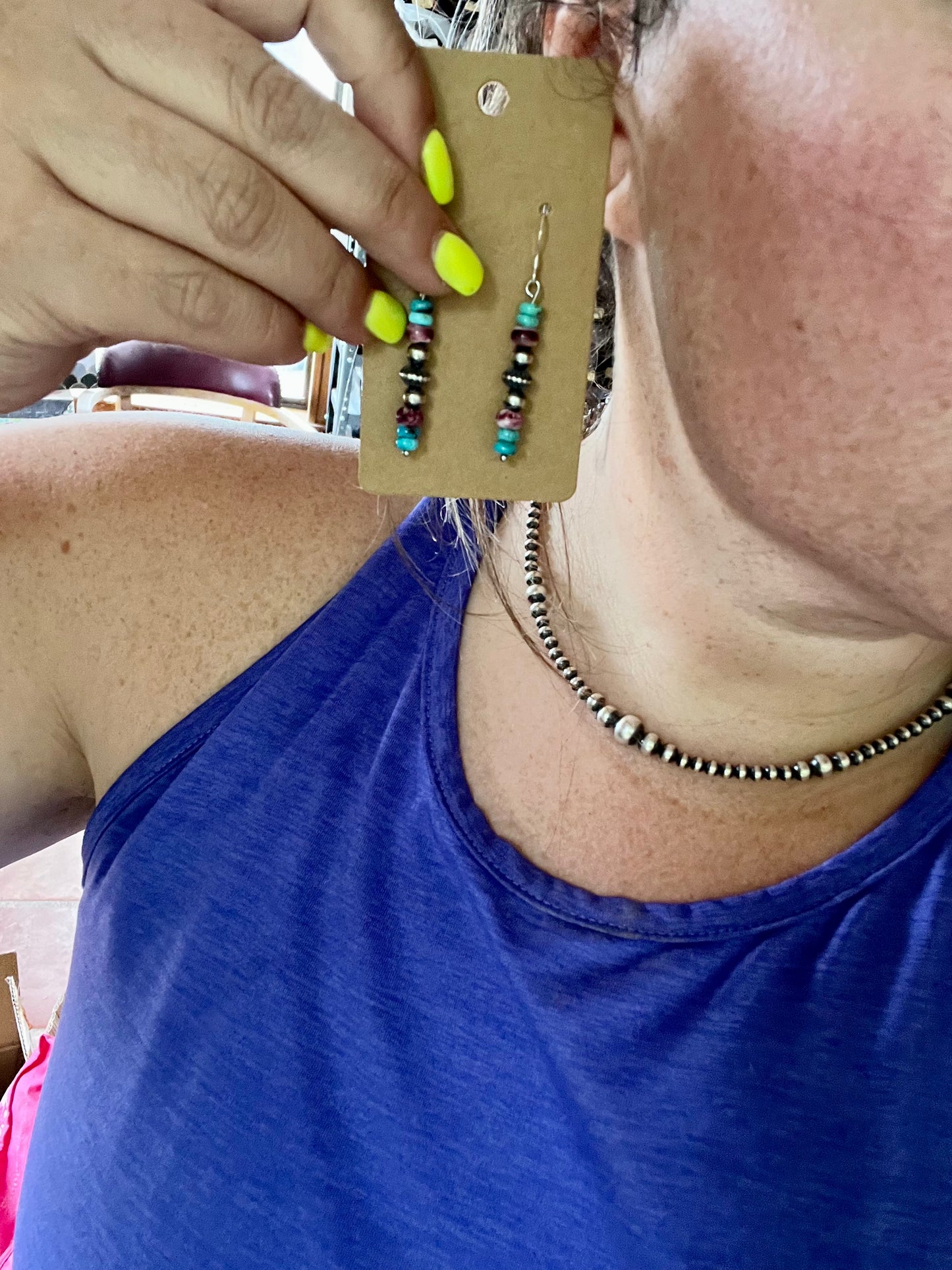 Purple and turquoise dangle earrings with Navajos