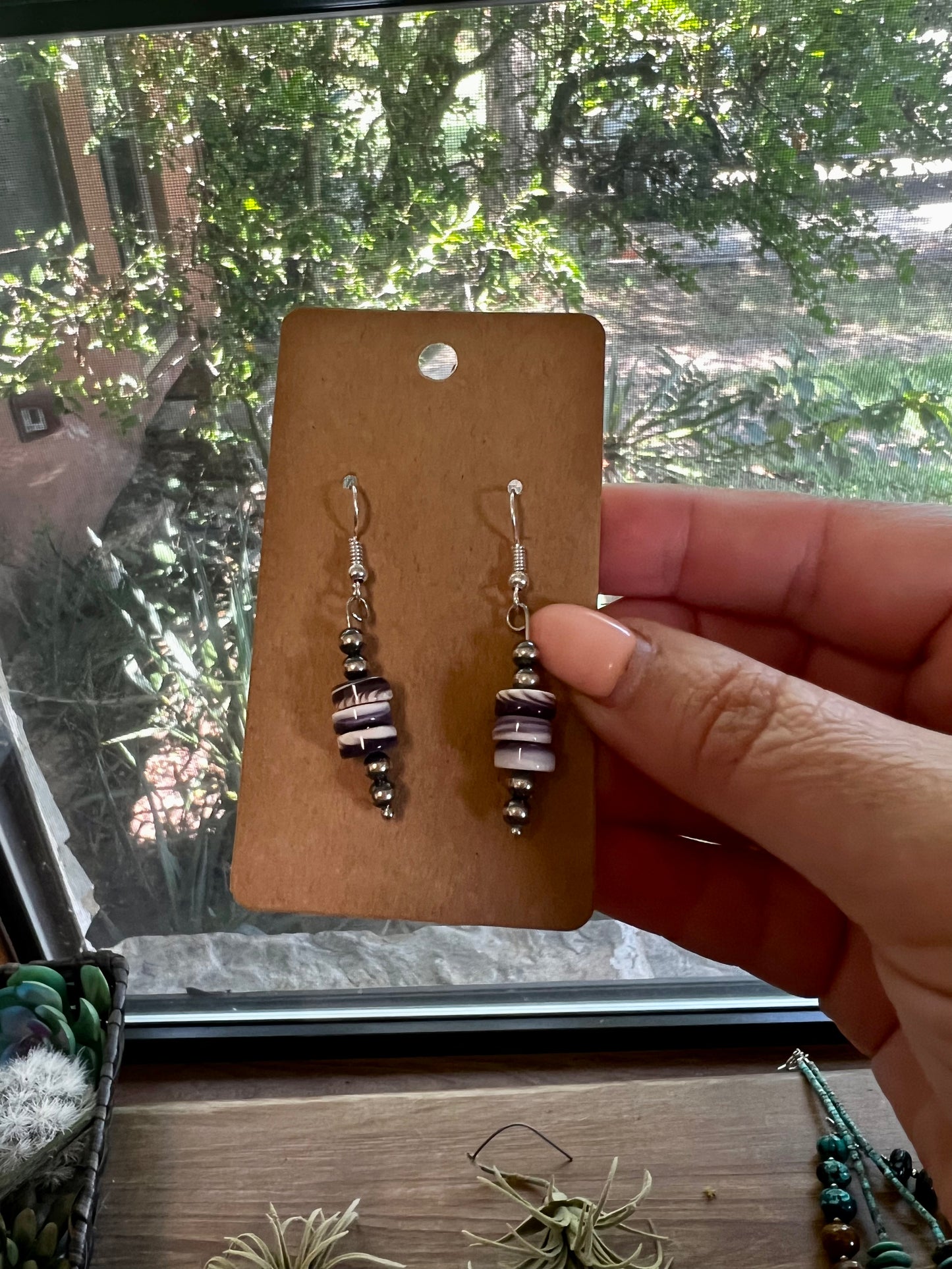 Wampum shell dangle earrings with Navajos