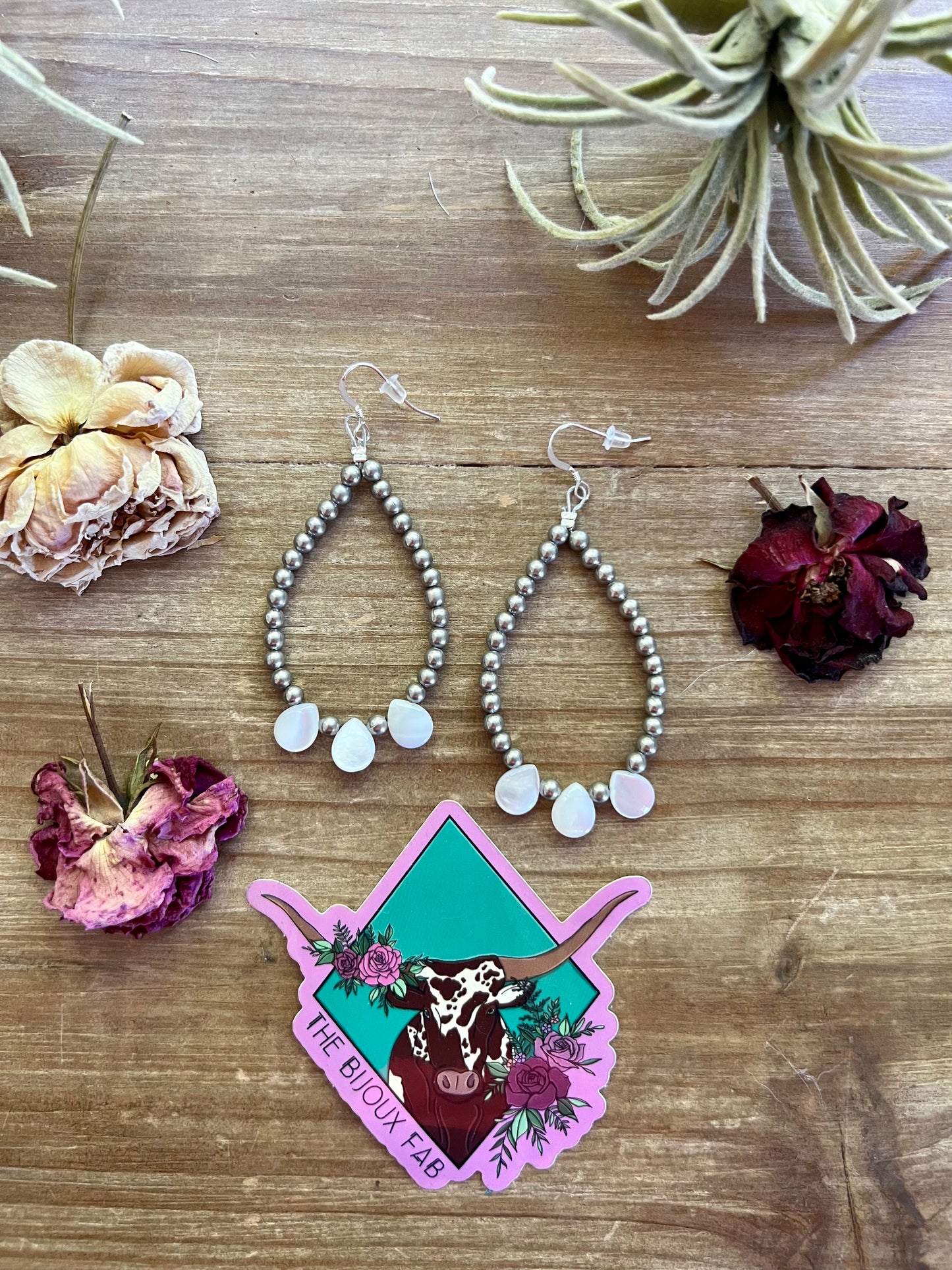 White shell teardrop earrings dangle