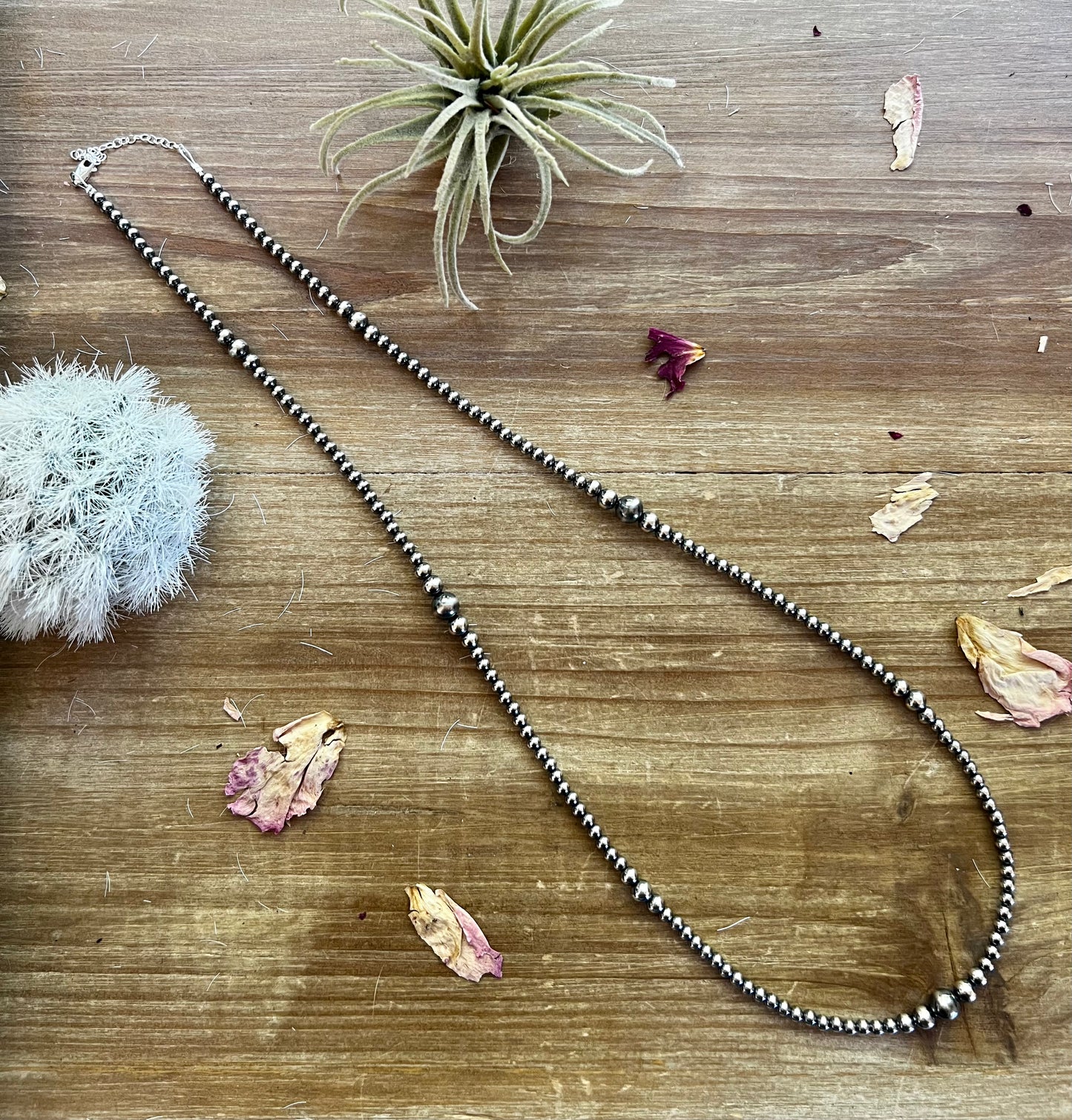 28 inch graduated Sterling Silver Pearls necklace