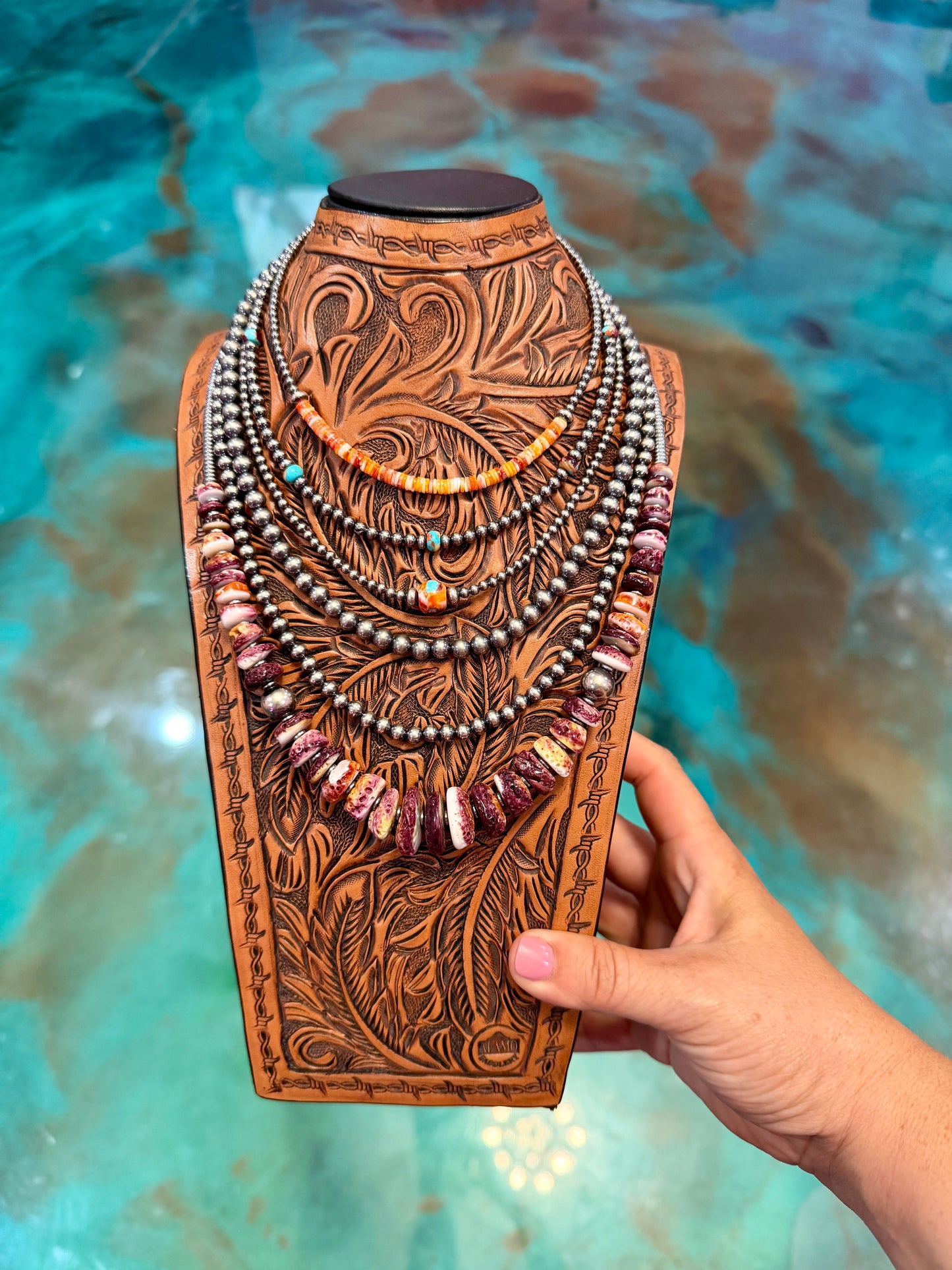 Layered sterling silver pearl necklace stack featuring purple spiny oyster, Mohave turquoise, Mojave beads, hematite saucers, and handmade western jewelry by The Bijoux FAB