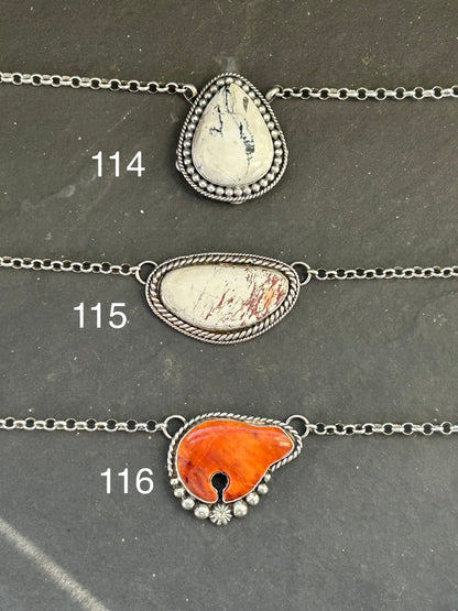 Sterling silver fixed chain necklace with orange spiny oyster bear by Texas artist Jason Ogg
