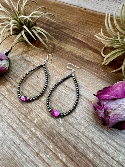 3-inch sterling silver teardrop earrings with dyed pink turquoise center bead, handmade by The Bijoux FAB in the USA