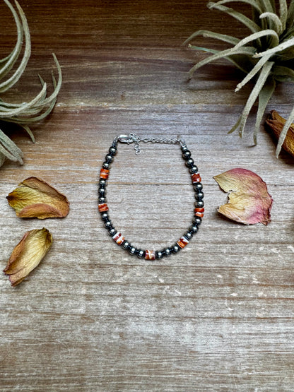 Sterling silver pearl bracelet with red-orange spiny oyster heishi, 6.75” long with extender, handmade by The Bijoux FAB