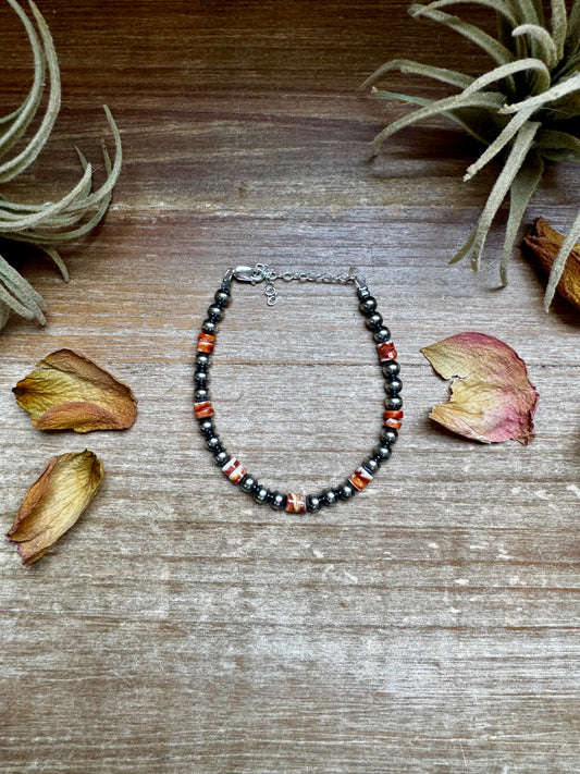 Sterling silver pearl bracelet with red-orange spiny oyster heishi, 6.75” long with extender, handmade by The Bijoux FAB