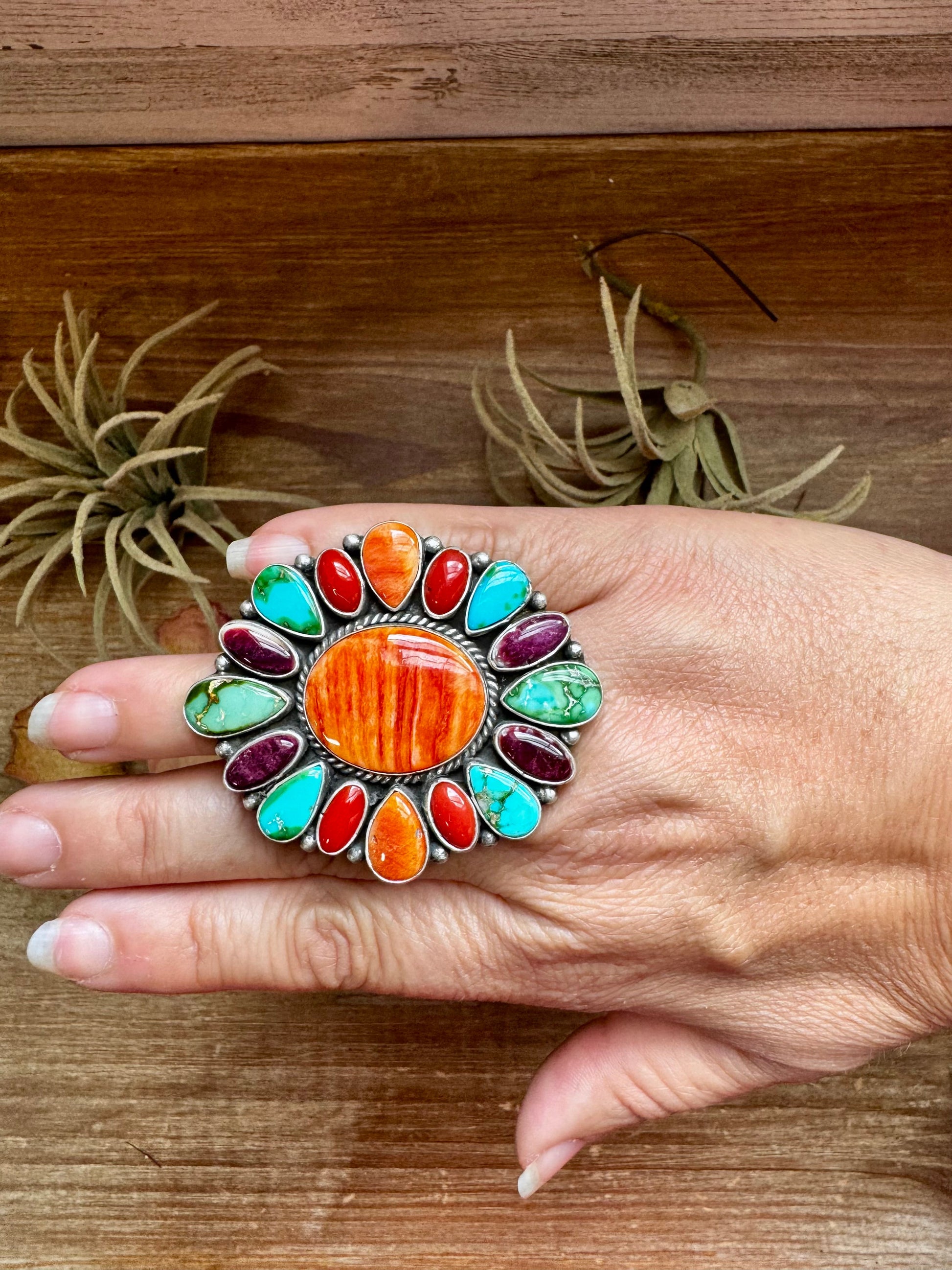 Adjustable Native made sterling silver cluster ring by E. Richards with orange spiny oyster center and Sonoran Gold turquoise accents