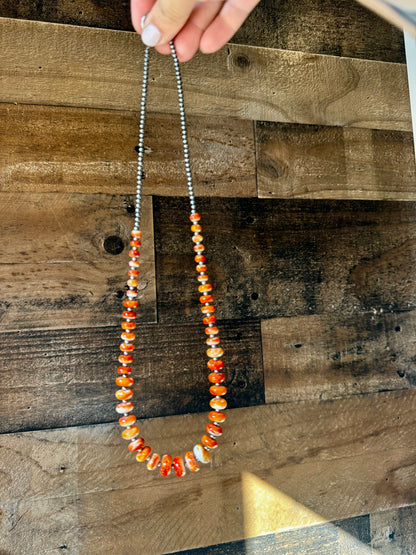 22 Inch orange spiny and sterling silver pearls