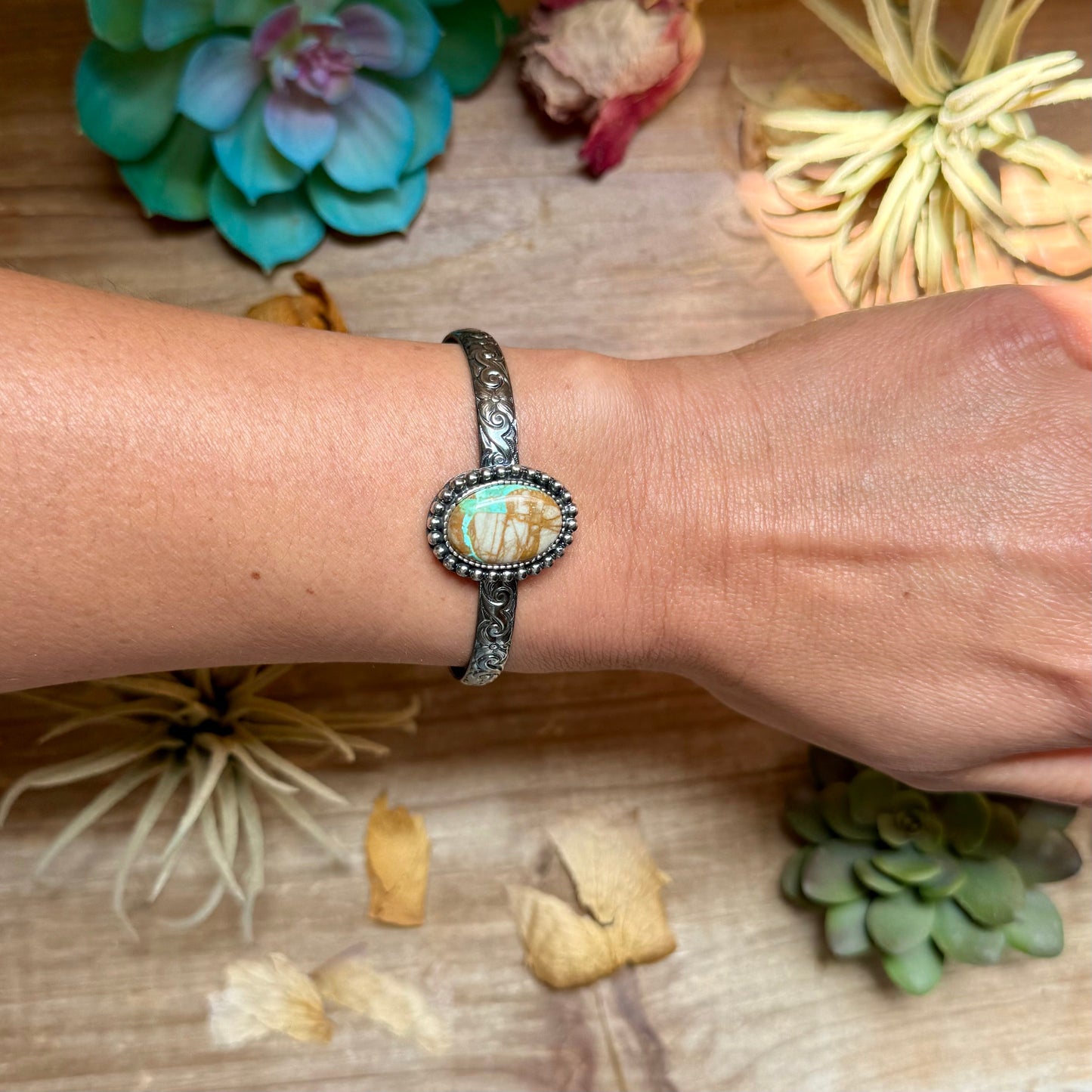 Handmade sterling silver cuff with medium Royston turquoise stone by MJ for The Bijoux FAB.
