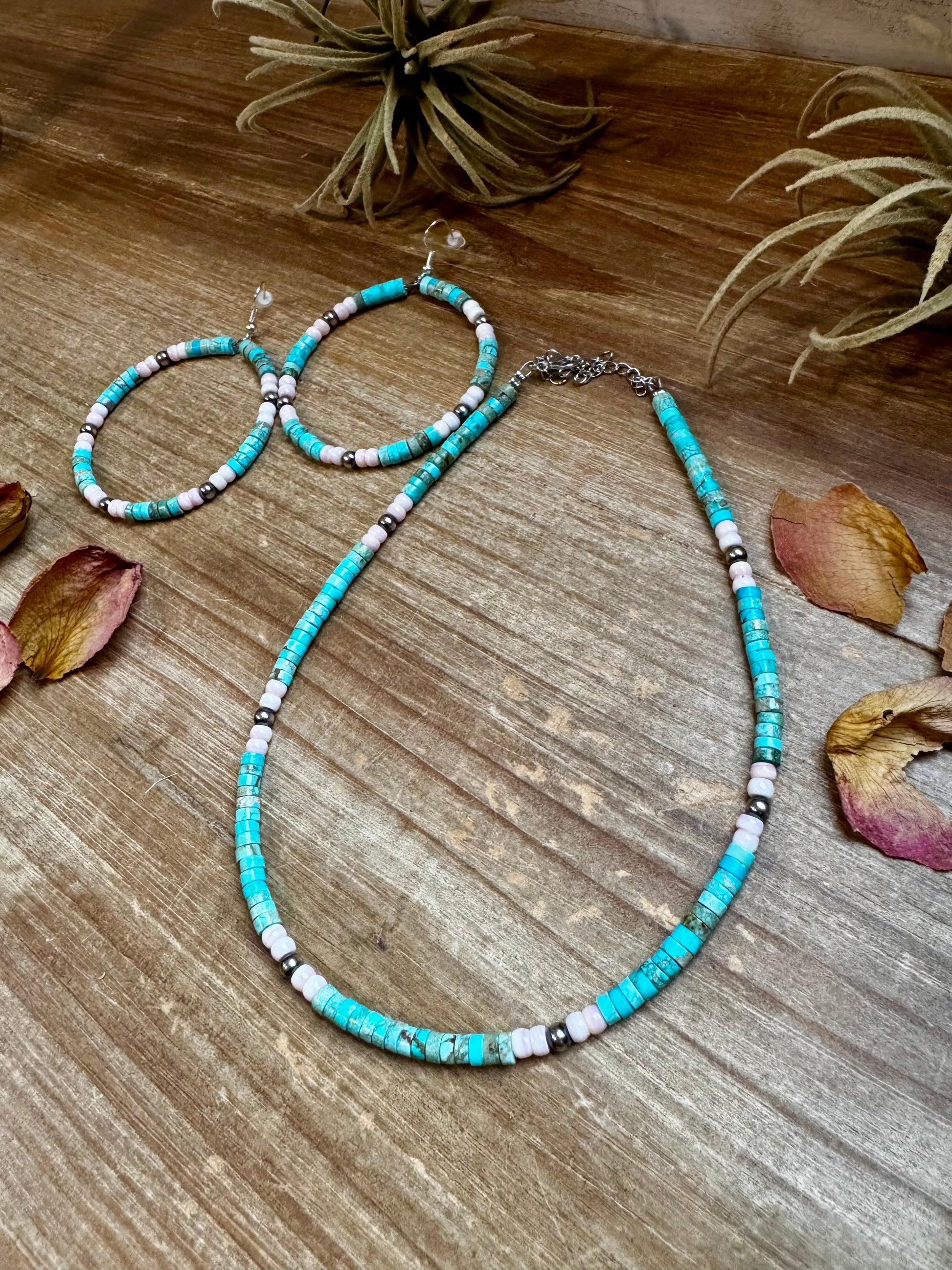 Handmade 14-inch choker with 3-inch extender, featuring 4mm turquoise variscite, pink conch, and sterling silver beads. Finished with silver-plated findings. Made in North Texas and exclusive to The Bijoux FAB. Matching earrings available.