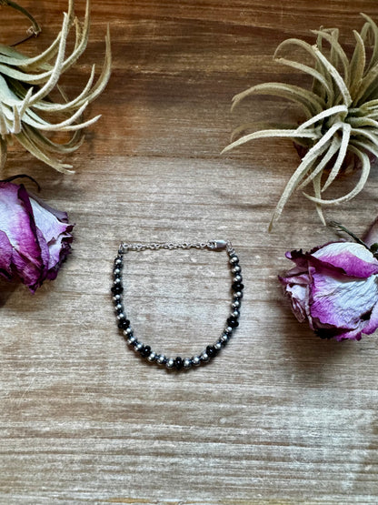 Sterling silver pearl bracelet with 6mm black onyx rondelle accent, handmade by The Bijoux FAB in the USA