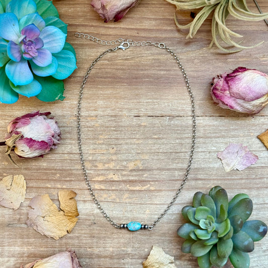 Oval turquoise center necklace with sterling silver saucer pearls on box chain
