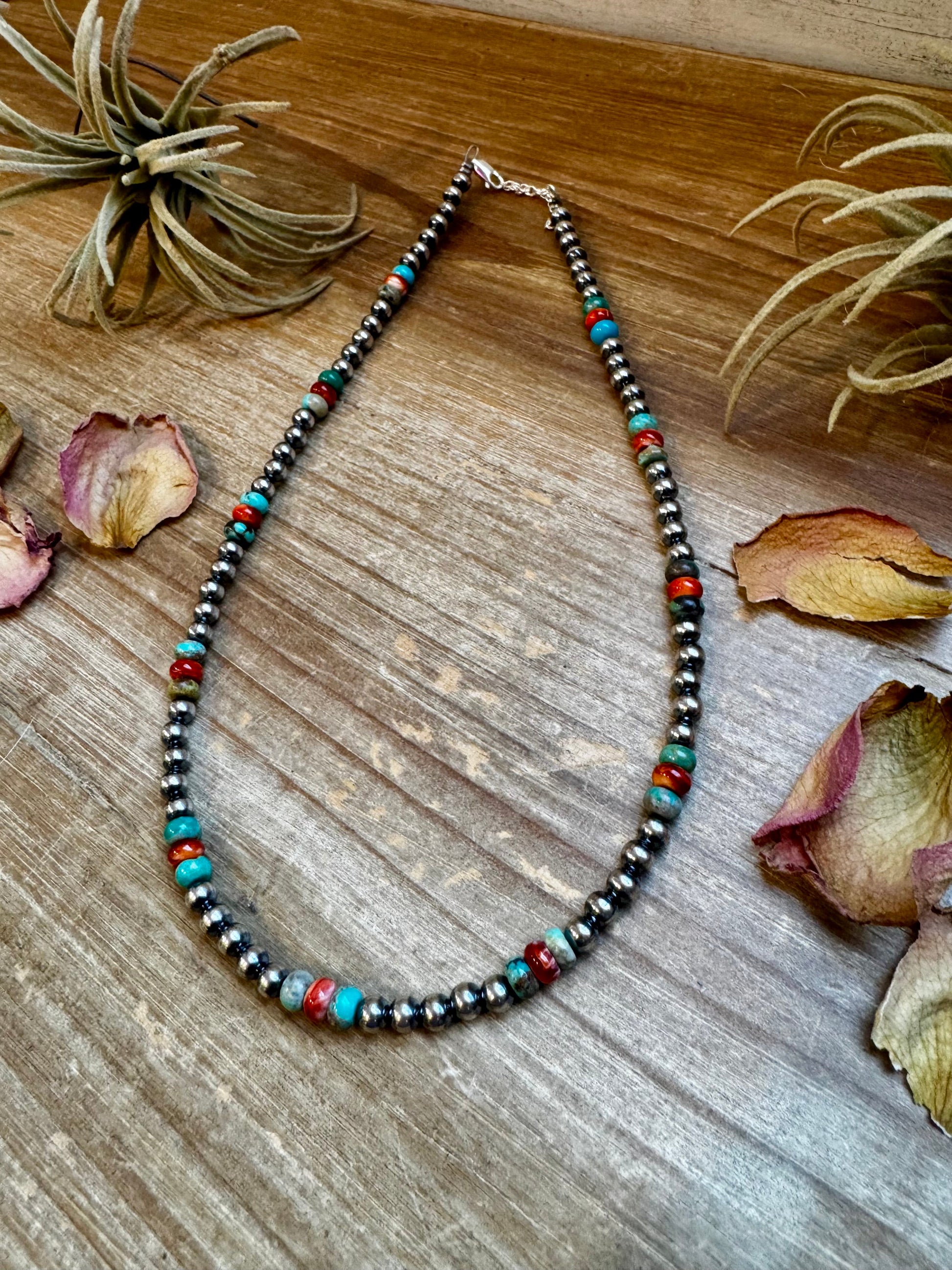 Handmade 18-inch sterling silver pearl necklace with turquoise and spiny oyster beads, shown with extender for layering