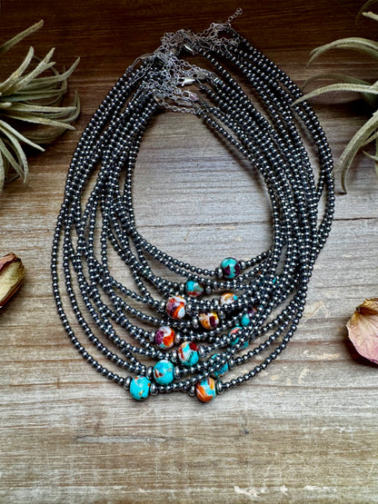 Handmade 14-inch sterling silver pearl choker with a center Mojave bead framed by 5mm saucers, finished with extender, made by The Bijoux FAB