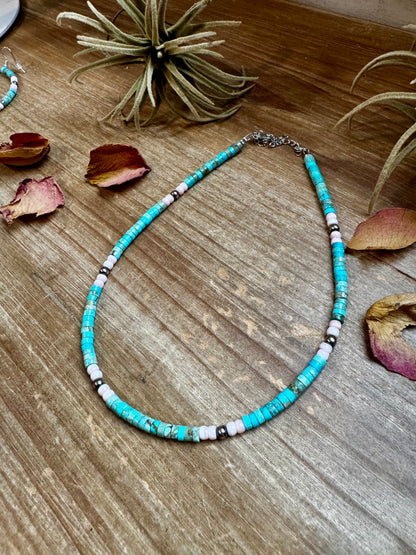 Handmade 14-inch choker with 3-inch extender, featuring 4mm turquoise variscite, pink conch, and sterling silver beads. Finished with silver-plated findings. Made in North Texas and exclusive to The Bijoux FAB. Matching earrings available.