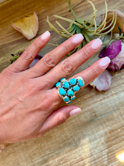 Adjustable longhorn-shaped sterling-silver ring with Kingman turquoise stone, stamped ZIA and Sterling, handmade in New Mexico USA