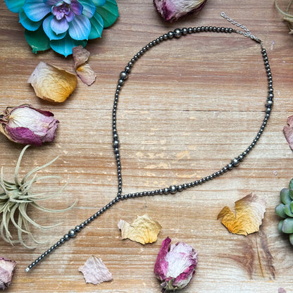 Lariat graduated sterling silver pearl