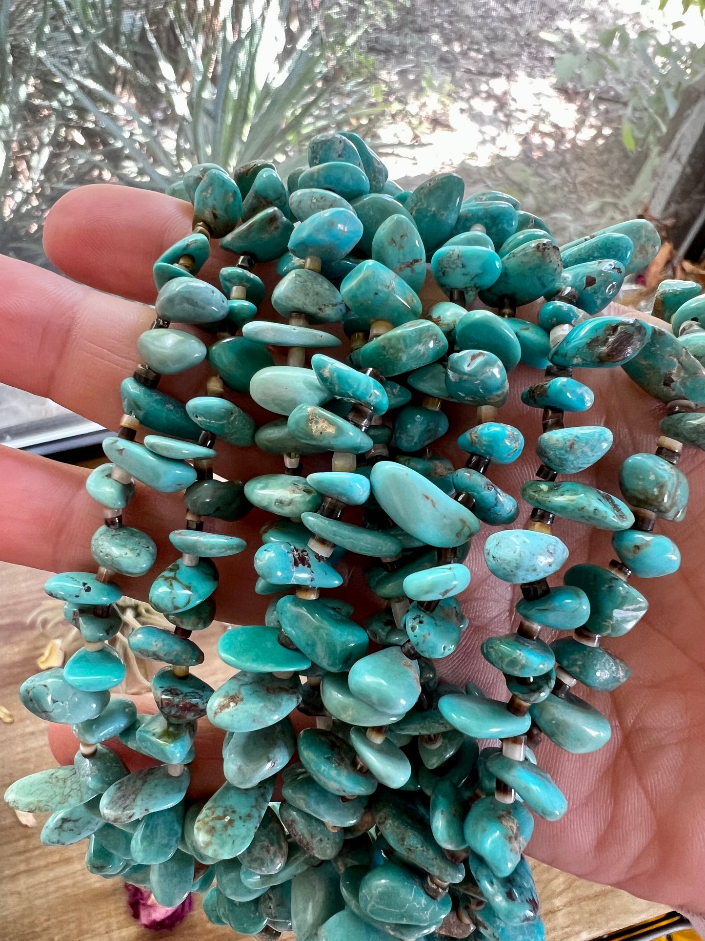 22 inch long real turquoise and shell teardrop shape blue side