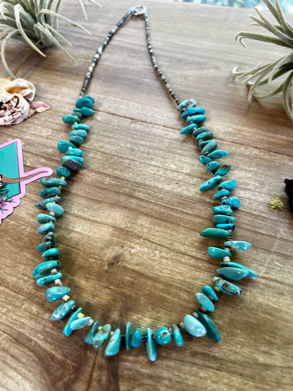 22 inch long real turquoise and shell teardrop shape blue side