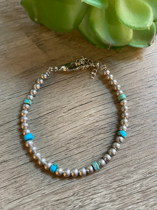Little bit of blue bracelet with silver plated bead